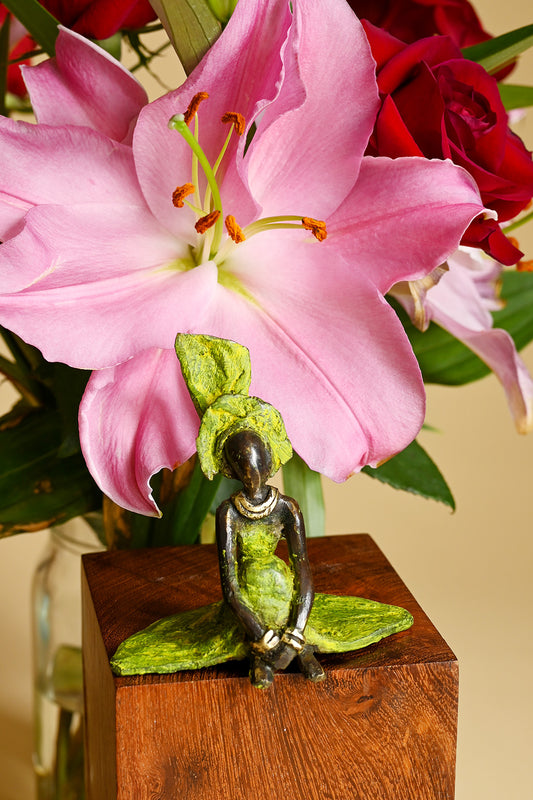 Contemplative Woman in Green Bronze Sculpture